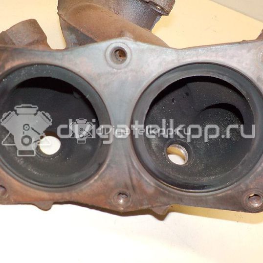 Фото Коллектор выпускной для двигателя QG18DE для Nissan Expert / Pulsar / Sentra / Sunny / Bluebird 106-128 л.с 16V 1.8 л бензин 14002AU300