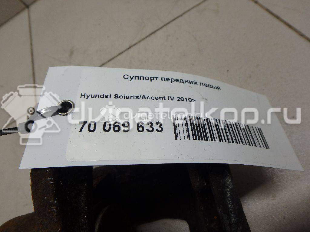 Фото Суппорт тормозной передний левый  581801RA00 для Hyundai I20 {forloop.counter}}