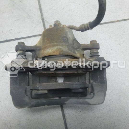 Фото Суппорт тормозной передний правый  581304L000 для Hyundai Accent / I20