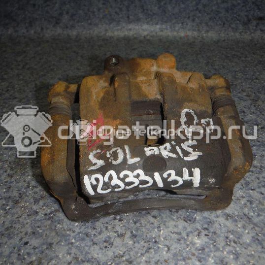 Фото Суппорт тормозной передний правый  581304L000 для Hyundai Accent / I20