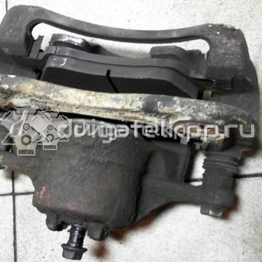 Фото Суппорт тормозной передний правый  581304L000 для Hyundai Accent / I20