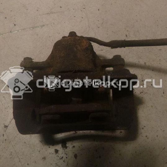 Фото Суппорт тормозной передний правый  581304L000 для Hyundai Accent / I20