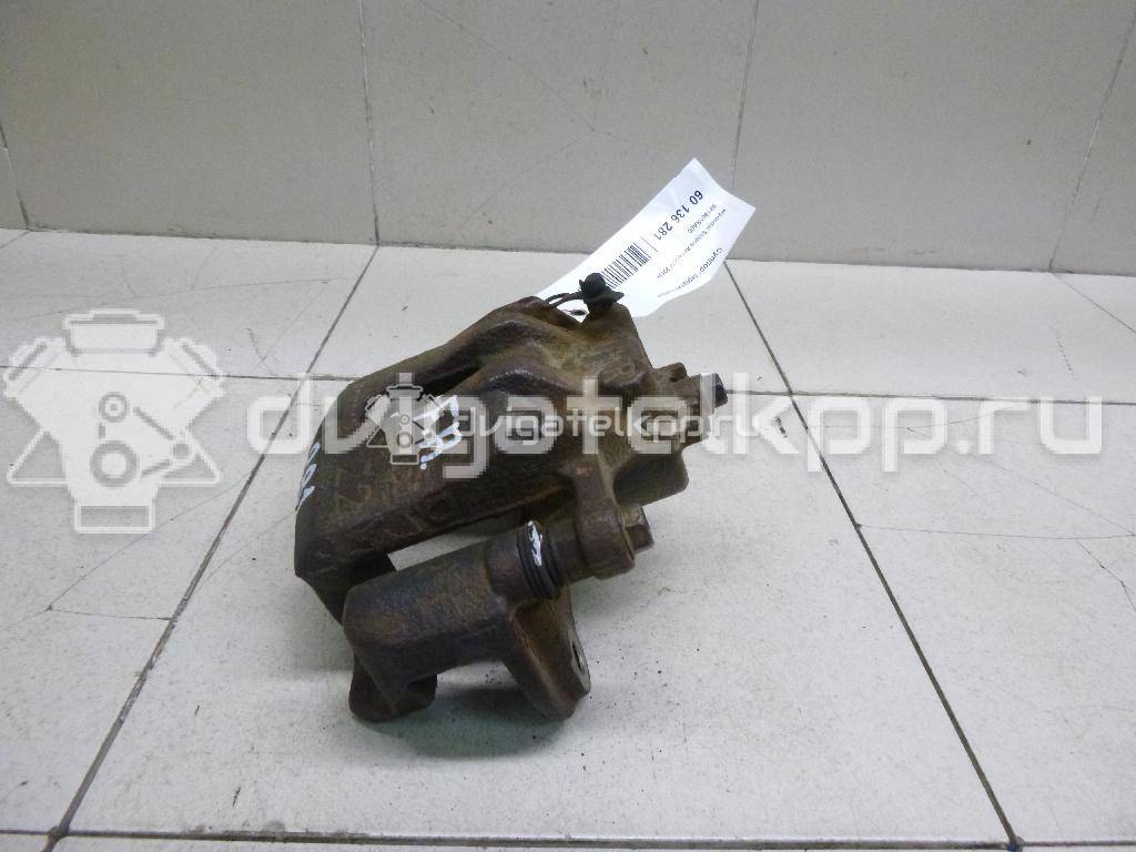 Фото Суппорт тормозной передний правый  581901RA00 для Hyundai I20 {forloop.counter}}