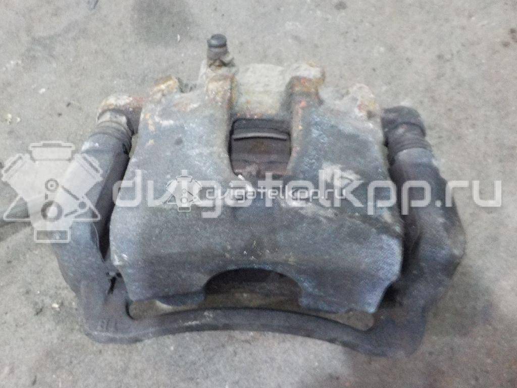 Фото Суппорт тормозной передний правый  581901RA00 для Hyundai I20 {forloop.counter}}