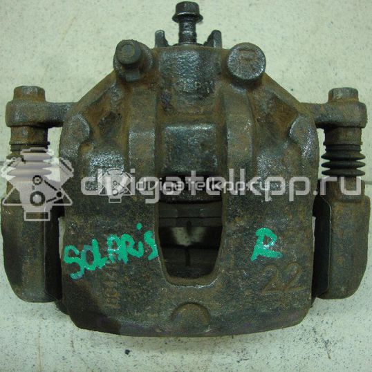 Фото Суппорт тормозной передний правый  581901RA00 для Hyundai I20