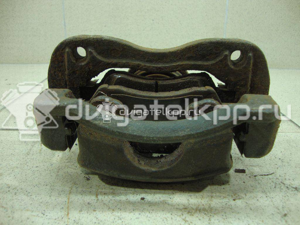 Фото Суппорт тормозной передний правый  581901RA00 для Hyundai I20 {forloop.counter}}