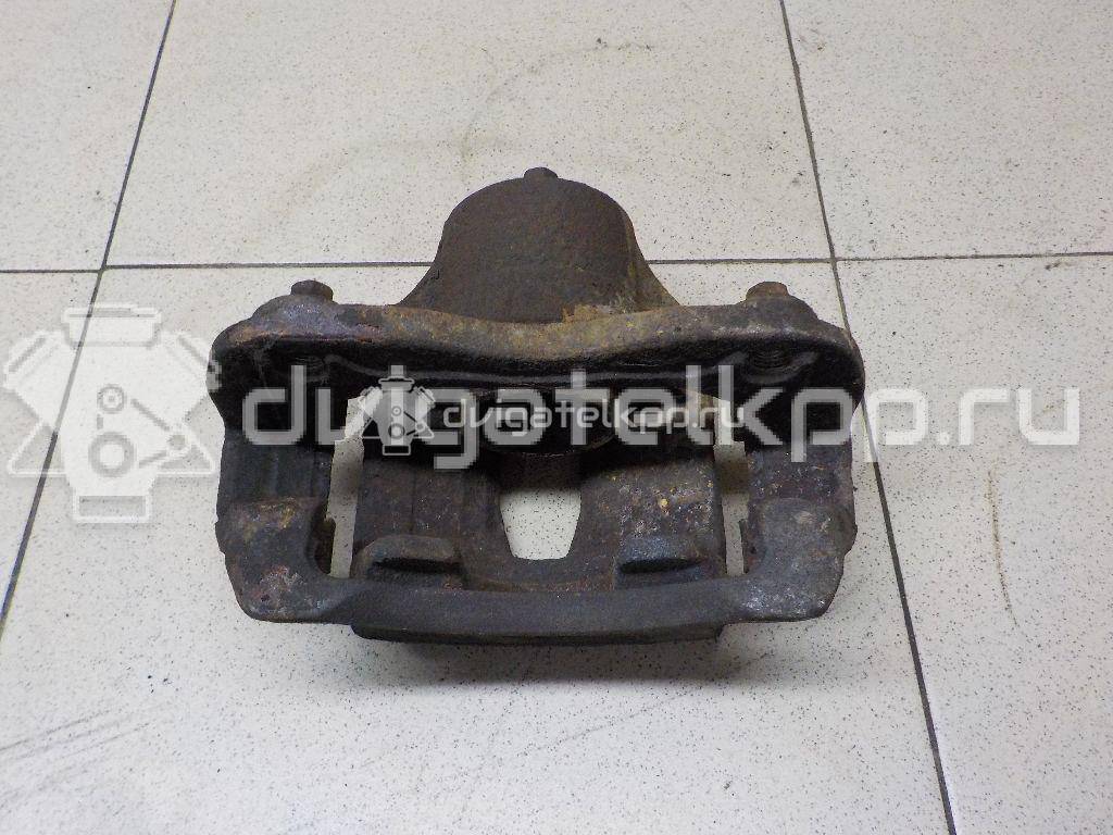 Фото Суппорт тормозной передний правый  581901RA00 для Hyundai I20 {forloop.counter}}