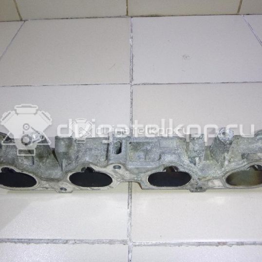 Фото Коллектор впускной для двигателя QR25DE для Nissan (Dongfeng) / Suzuki / Mitsuoka / Nissan 141-203 л.с 16V 2.5 л Бензин / этиловый спирт / природный газ 14040JA05A