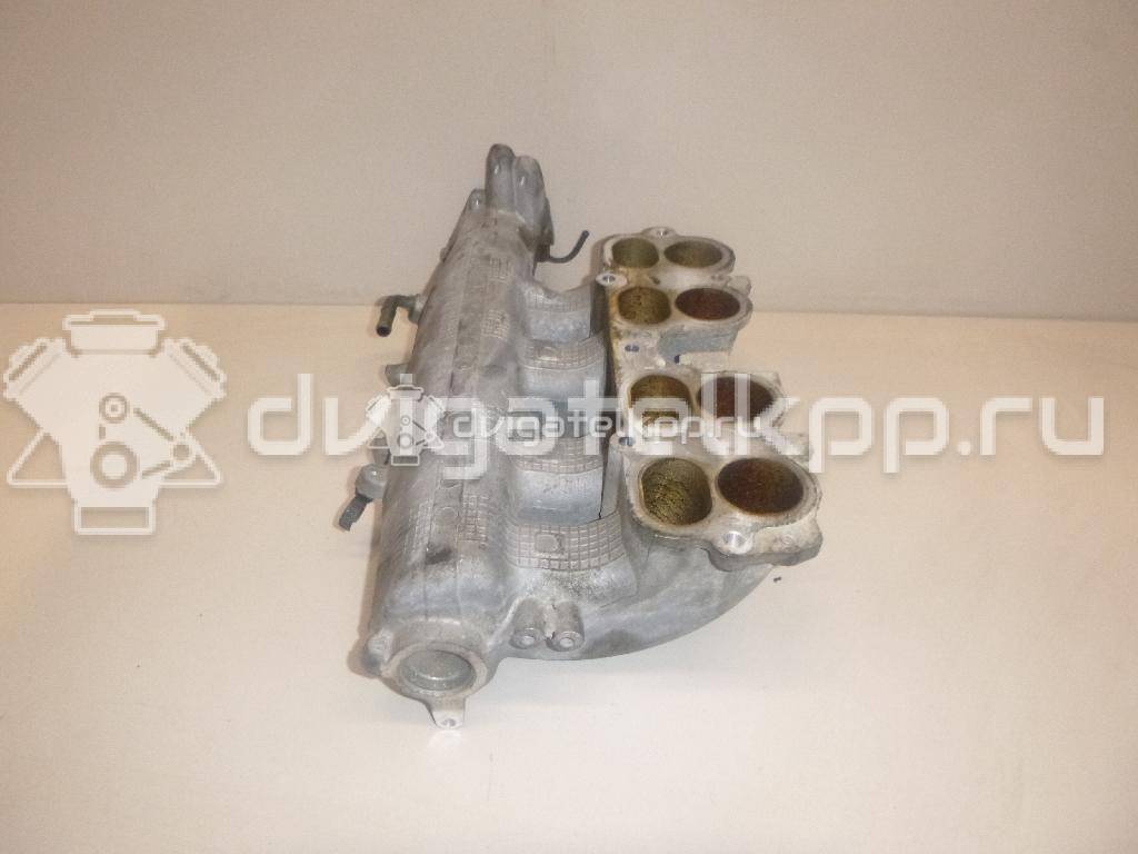 Фото Коллектор впускной для двигателя QR25DE для Nissan (Dongfeng) / Suzuki / Mitsuoka / Nissan 141-203 л.с 16V 2.5 л Бензин / этиловый спирт / природный газ 14010AE001 {forloop.counter}}