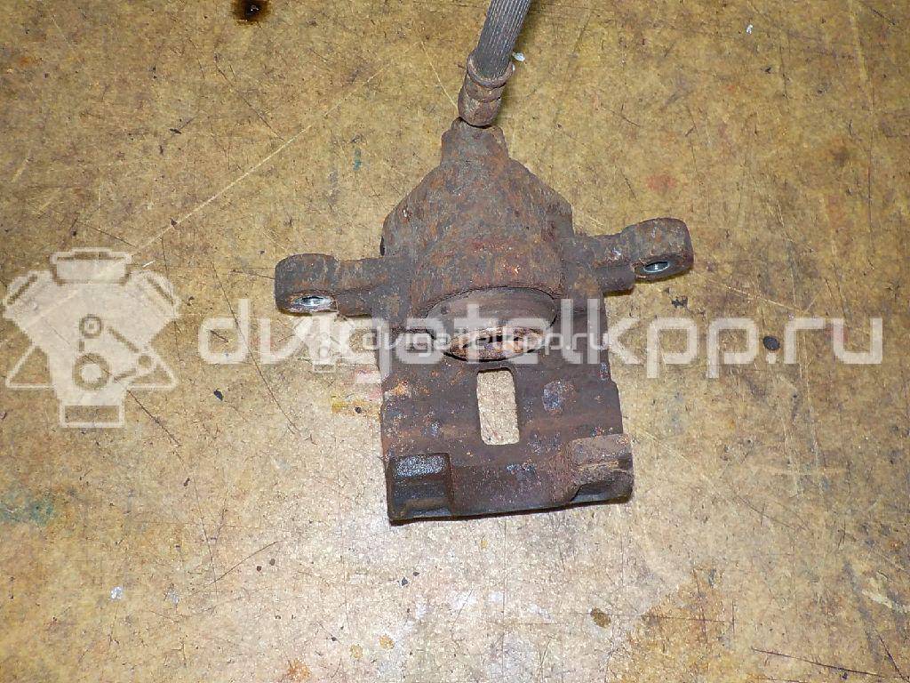 Фото Суппорт тормозной задний правый  584001G300 для Kia Rio {forloop.counter}}