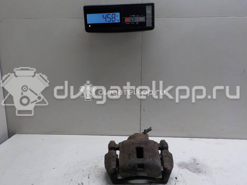 Фото Суппорт тормозной передний левый  K0BB149990 для Kia Rio / Shuma Fb {forloop.counter}}