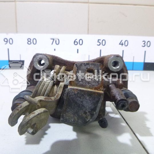 Фото Суппорт тормозной задний правый  0K2N349980 для Kia Shuma Fb / Carens / Sephia Fa / Clarus
