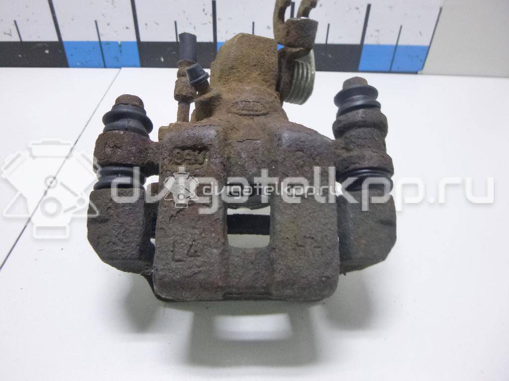 Фото Суппорт тормозной задний левый  0K2N349990 для Kia Shuma Fb / Carens / Sephia Fa / Clarus {forloop.counter}}