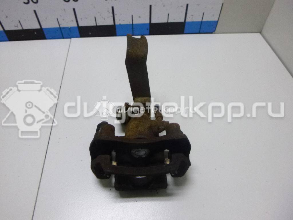 Фото Суппорт тормозной задний левый  0K2N349990 для Kia Shuma Fb / Carens / Sephia Fa / Clarus {forloop.counter}}