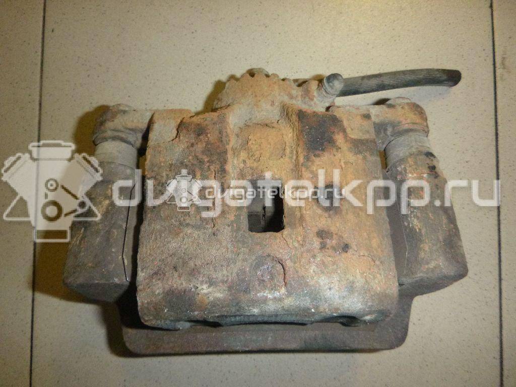 Фото Суппорт тормозной задний левый  582103E000 для Kia Sorento {forloop.counter}}