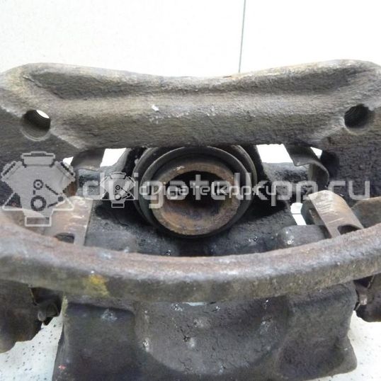 Фото Суппорт тормозной задний правый  582301D100 для Kia Carens