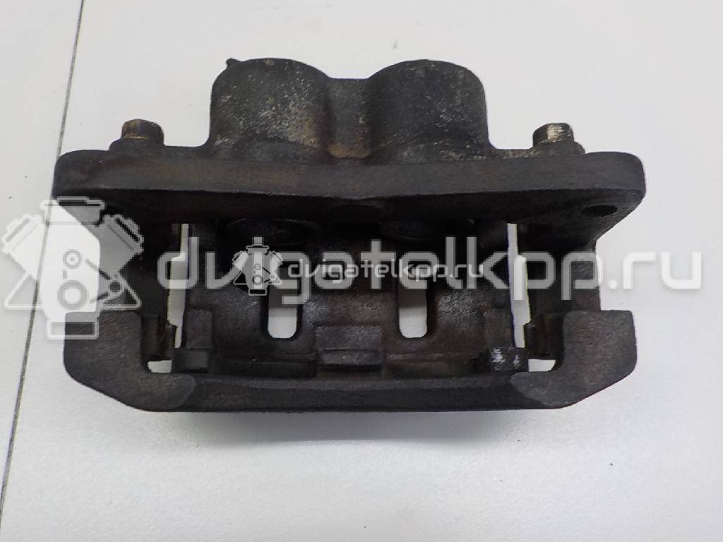 Фото Суппорт тормозной передний левый  0K56A33990B для Kia Carnival {forloop.counter}}