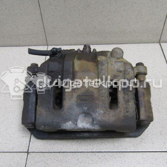 Фото Суппорт тормозной передний левый  581104D200 для Kia Carnival