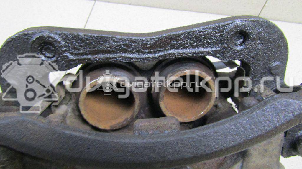 Фото Суппорт тормозной передний левый  581104D200 для Kia Carnival {forloop.counter}}