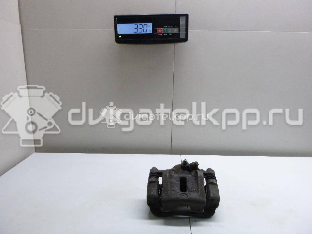 Фото Суппорт тормозной задний правый  582304D200 для Kia Carnival {forloop.counter}}