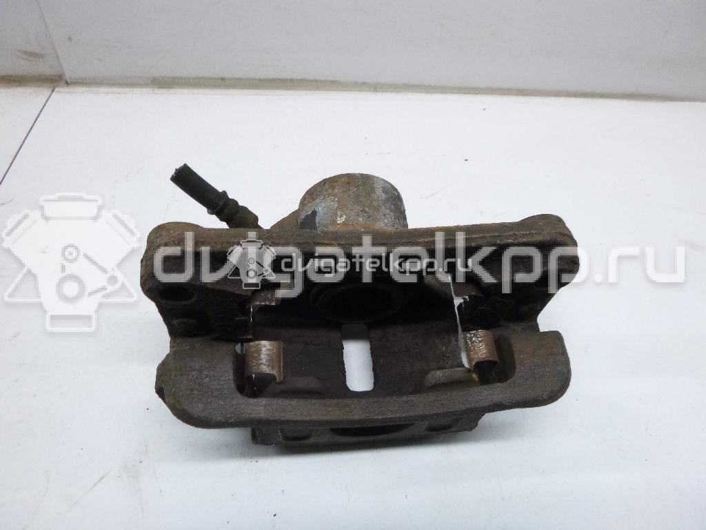 Фото Суппорт тормозной задний правый  582304D200 для Kia Carnival {forloop.counter}}