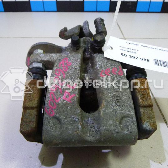 Фото Суппорт тормозной задний левый  58310A2A30 для Kia Venga Yn / Ceed / Pro Ceed