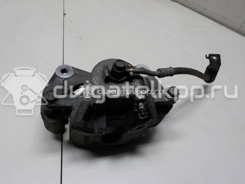 Фото Суппорт тормозной передний левый  581101W350 для Kia Rio {forloop.counter}}