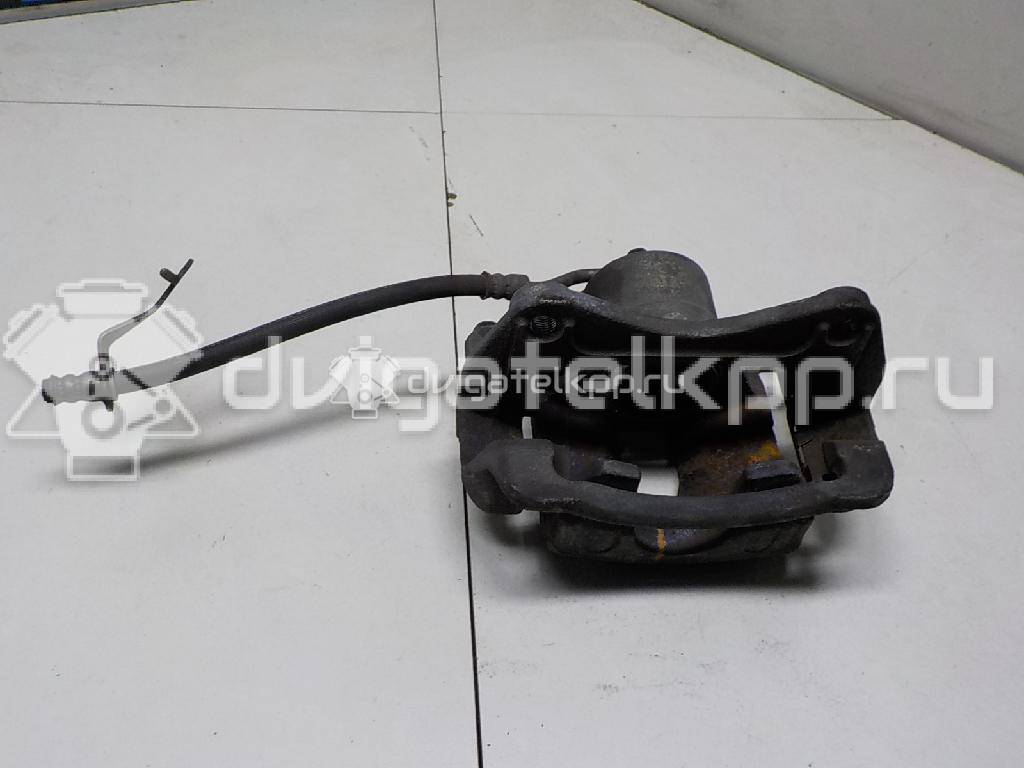 Фото Суппорт тормозной передний левый  581101W350 для Kia Rio {forloop.counter}}