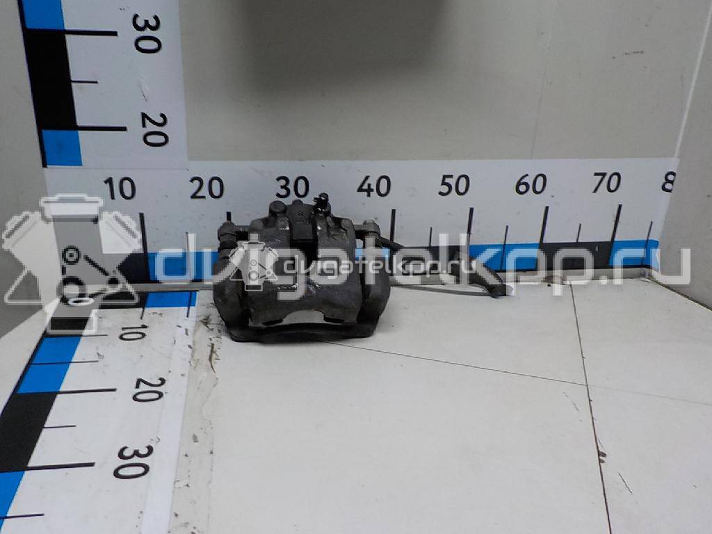 Фото Суппорт тормозной передний левый  581101W350 для Kia Rio {forloop.counter}}