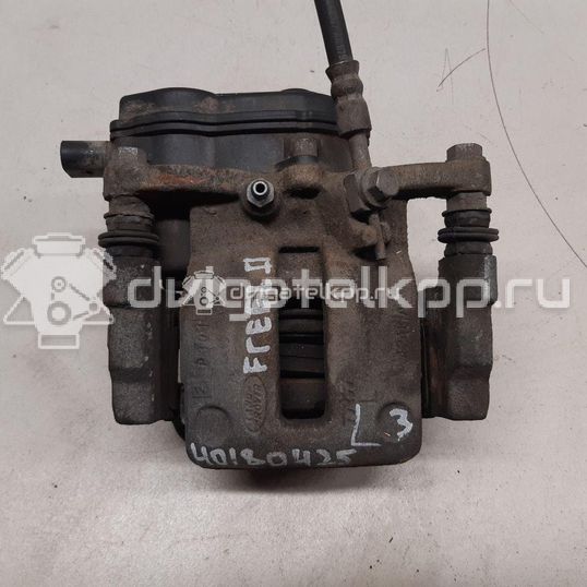 Фото Суппорт тормозной задний левый  LR043283 для Land Rover Freelander