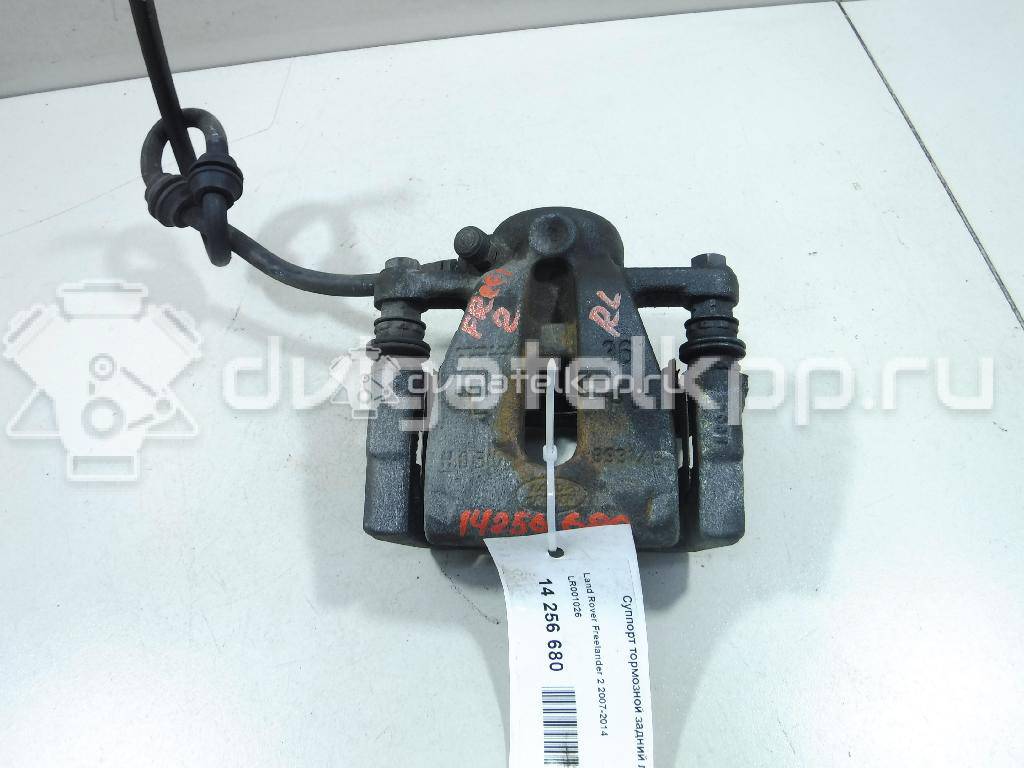 Фото Суппорт тормозной задний левый  LR001026 для Land Rover Freelander {forloop.counter}}
