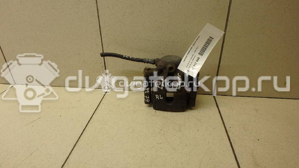 Фото Суппорт тормозной задний левый  LR001027 для Land Rover Freelander {forloop.counter}}