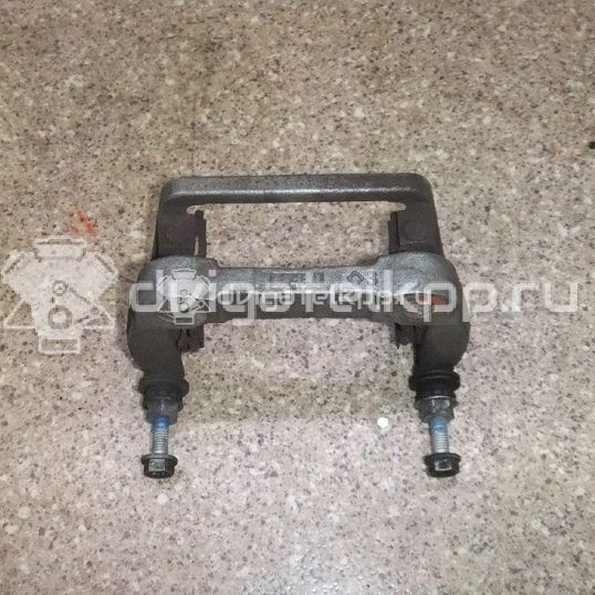 Фото Скоба суппорта заднего  LR027130 для Land Rover Freelander / Range Rover