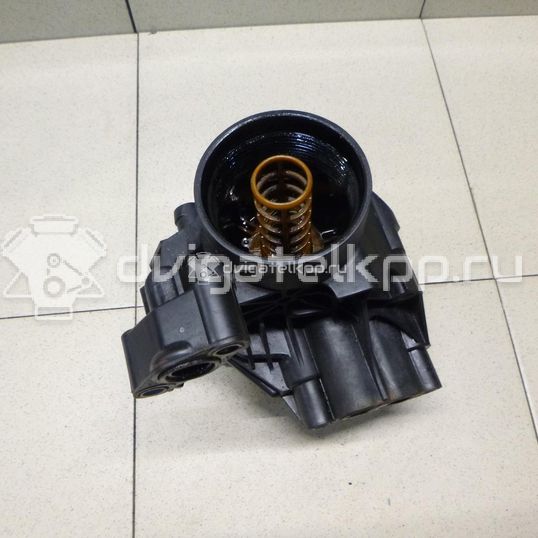 Фото Кронштейн масляного фильтра для двигателя CLHA для Volkswagen Golf 105 л.с 16V 1.6 л Дизельное топливо 03N115389A