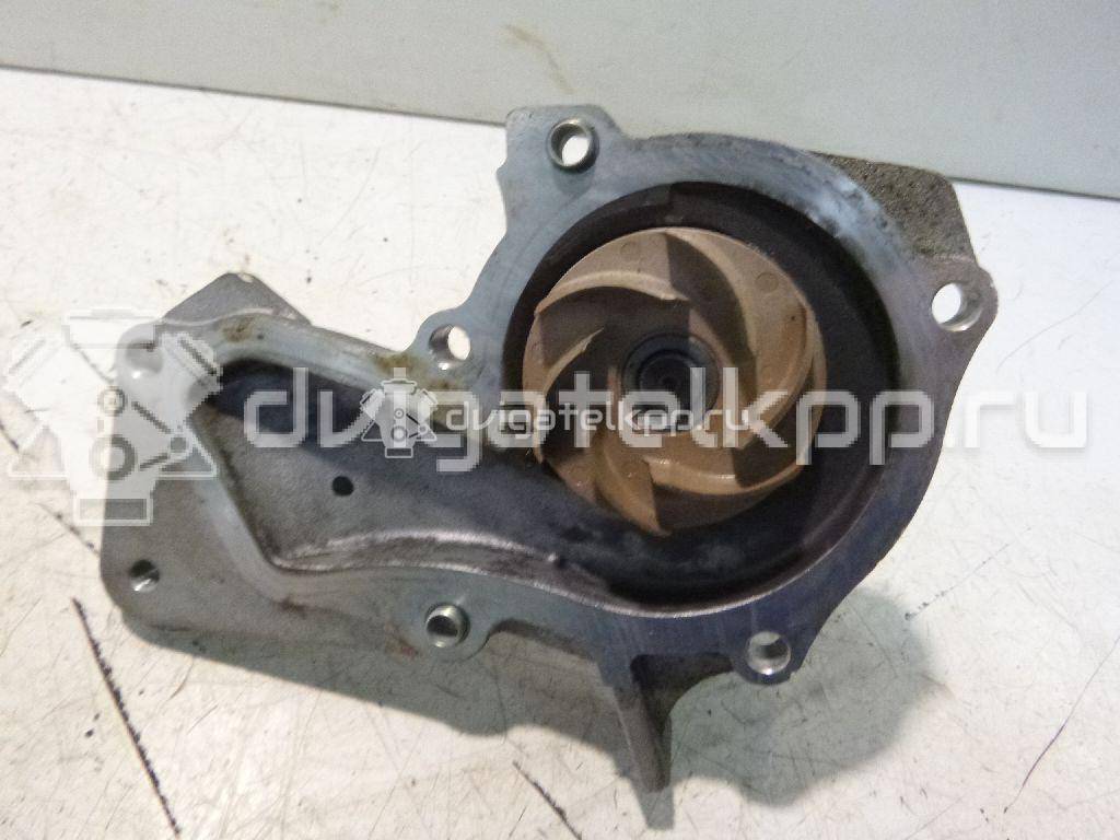 Фото Насос водяной (помпа)  1472867 для mazda 121 (ZQ) {forloop.counter}}