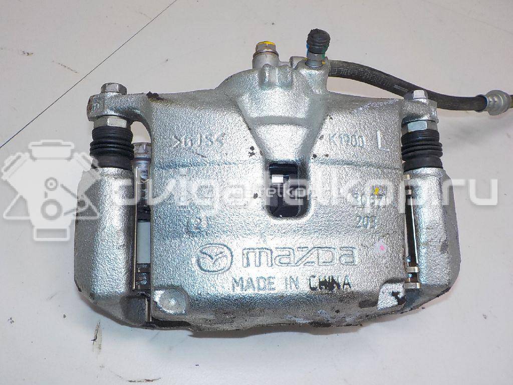 Фото Суппорт тормозной передний левый  B4Y73399ZB для Mazda Cx-3 Dk / 3 {forloop.counter}}
