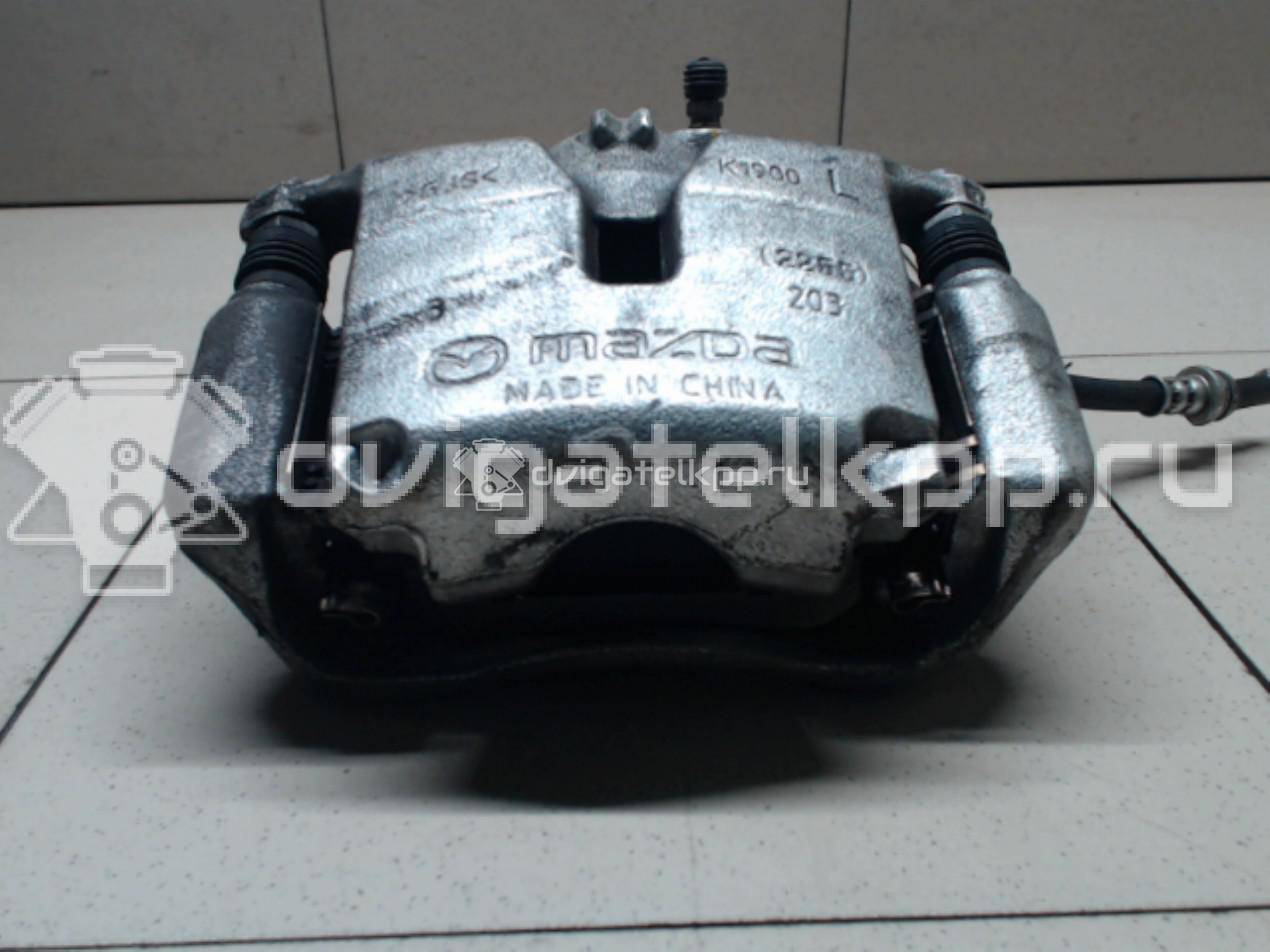 Фото Суппорт тормозной передний левый  B4Y73399ZB для Mazda Cx-3 Dk / 3 {forloop.counter}}