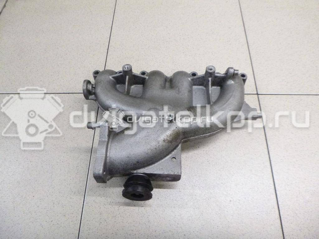 Фото Коллектор впускной для двигателя BXE для Volkswagen Passat / Touran / Jetta / Golf 105 л.с 8V 1.9 л Дизельное топливо 03G129713C {forloop.counter}}