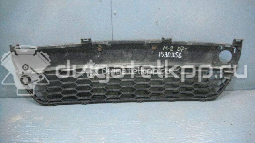 Фото Решетка в бампер центральная  D651501T0B для Mazda 2 {forloop.counter}}