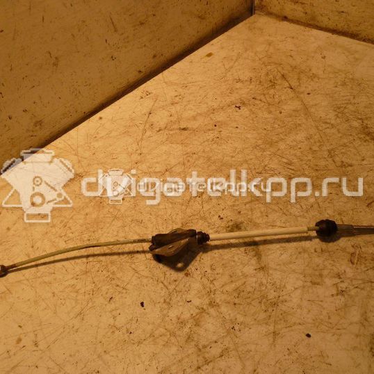 Фото Трос стояночного тормоза центральный  D65144150B для Mazda 2