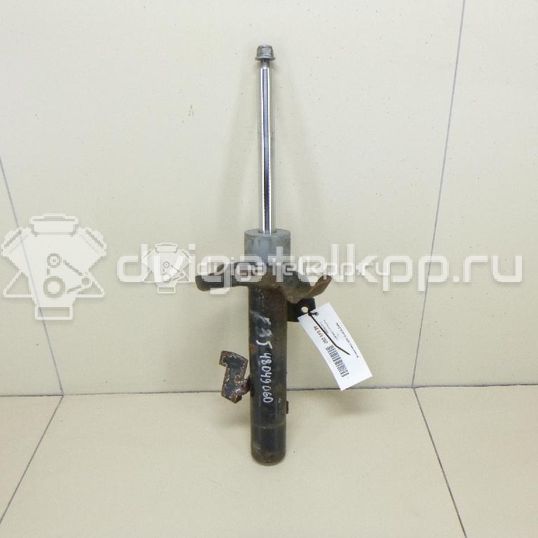 Фото Амортизатор передний левый  1595298 для mazda Mazda 3 (BK)