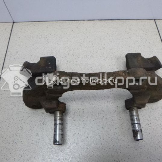 Фото Скоба суппорта переднего  1468864 для mazda Mazda 3 (BK)
