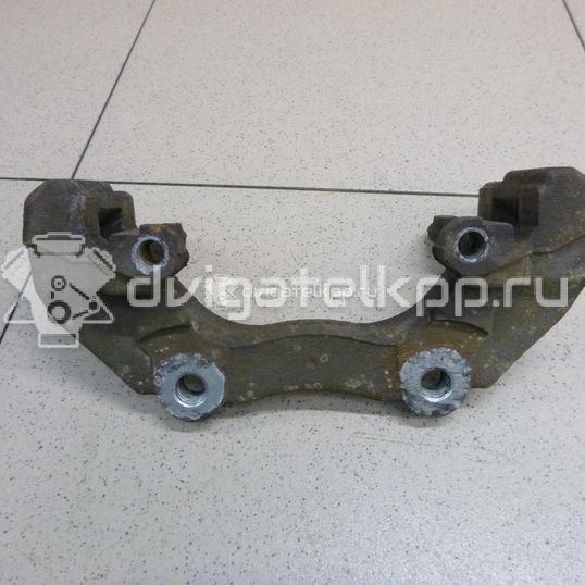 Фото Скоба суппорта переднего  1468864 для mazda Mazda 3 (BK)