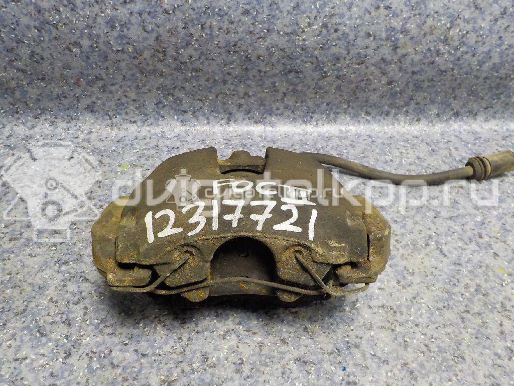 Фото Суппорт тормозной передний левый  1459585 для mazda Mazda 3 (BK) {forloop.counter}}