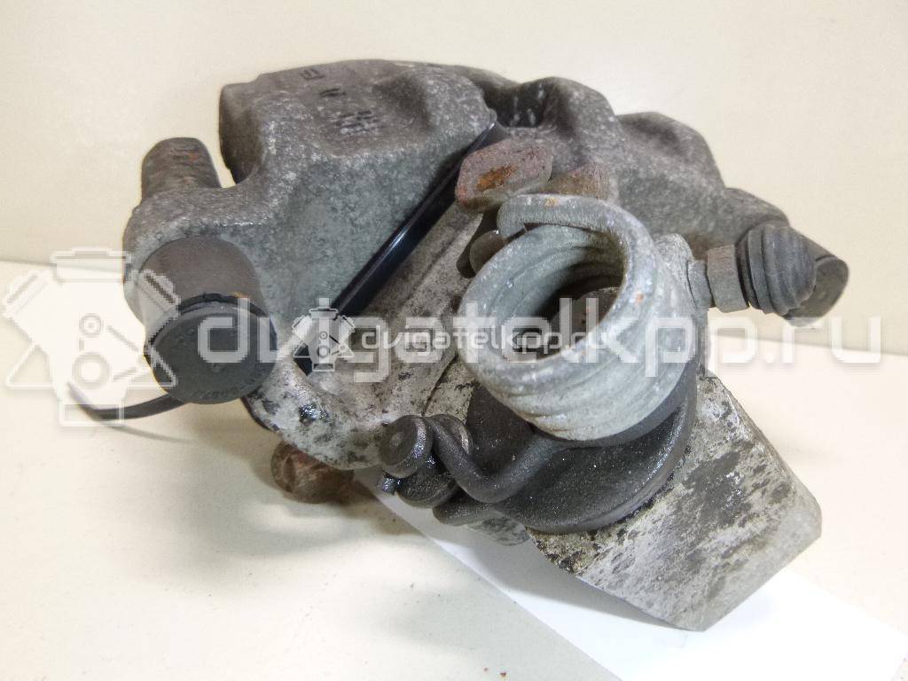 Фото Суппорт тормозной задний правый  1365648 для mazda Mazda 3 (BK) {forloop.counter}}