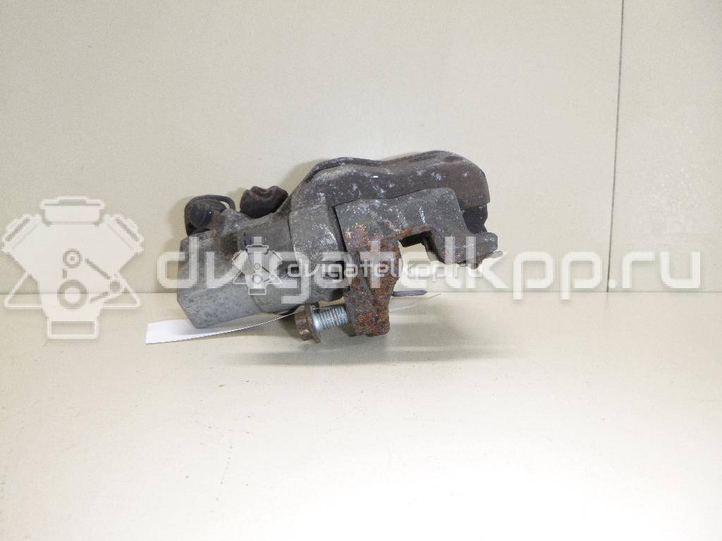 Фото Суппорт тормозной задний правый  1365648 для mazda Mazda 3 (BK) {forloop.counter}}
