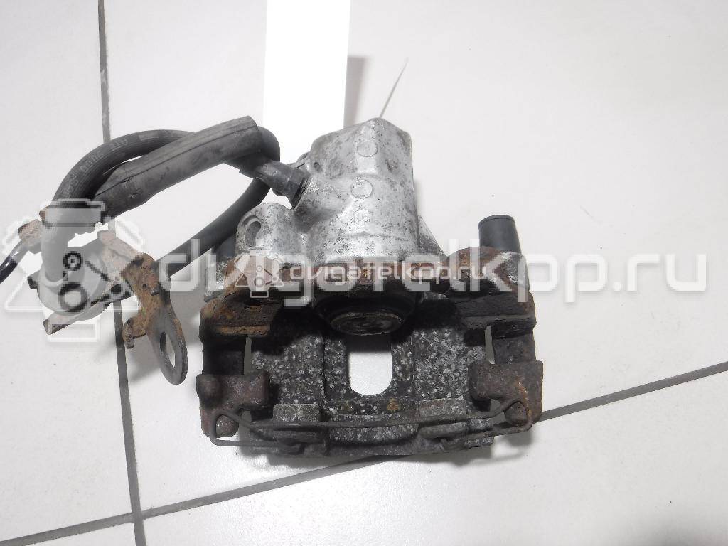 Фото Суппорт тормозной задний правый  2080513 для mazda Mazda 3 (BK) {forloop.counter}}