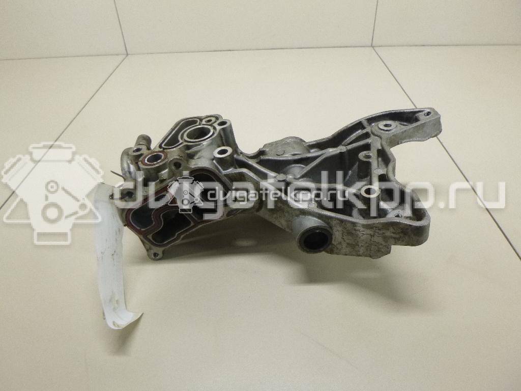 Фото Кронштейн генератора для двигателя CAWA для Volkswagen Jetta 170 л.с 16V 2.0 л бензин 06J903143AG {forloop.counter}}