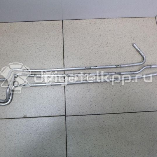 Фото Трубка топливная для двигателя BXE для Volkswagen Passat / Touran / Jetta / Golf 105 л.с 8V 1.9 л Дизельное топливо 03G130308K