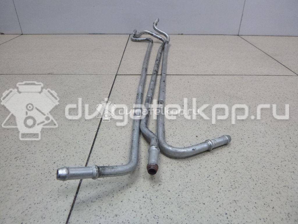 Фото Трубка топливная для двигателя BXE для Volkswagen Passat / Touran / Jetta / Golf 105 л.с 8V 1.9 л Дизельное топливо 03G130308K {forloop.counter}}